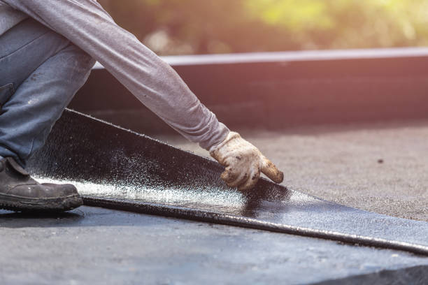 Professional Basement Waterproofing technician working in Custer, MI